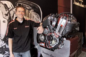 Eric Fox, chief designer of Indian’s Thunder Stroke 111 engine, with the final product at the Bike Week launch. (Photo by Robert Filla)
