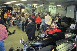 A tough draw in its first year at Vickery Motorsports, Snowmobile Movie Night is now bursting at the seams with attendees. Sales manager Brent Miller encourages his staff to “friend up” customers during the event.