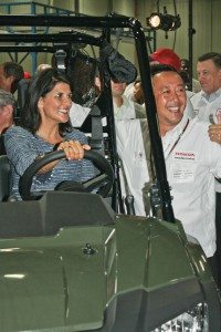 S.C. Gov. Nikki Haley and Honda’s Katsumi Fujimoto are all smiles in the 2014 Pioneer. (Photo by Kevin Wing)