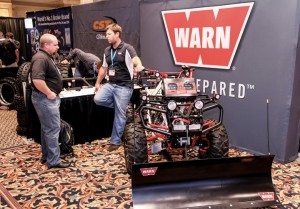 Patrick Storm of Warn Industries shows a near complete line of Warn products on this unique display machine. 