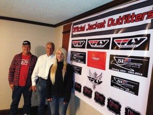 (From left) Ron Bentzinger, snowmobile product manager for Western Power Sports, Dave Consoer, sales & marketing manager for the Eagle River Derby, and Wendy Gavinski, president of Divas SnowGear, finalized the deal.