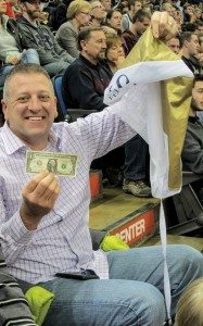Dave Hrejsa, Great Lakes Region sales manager for CFMOTO, pulled out a winner during a promotion that saw dollar bills rain down from the rafters at Target Center.