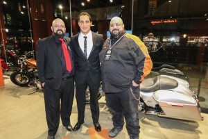General manager/parts John Maguire, president/general manager Asaf Jacobi and service manager Jim Maguire welcome guests to Harley-Davidson of New York City’s grand opening in Tribeca.