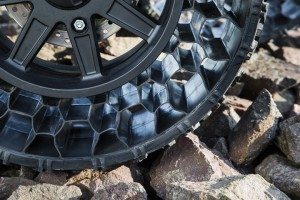 The polymetric web of the Polaris non-pneumatic tire is designed to crawl easily over rocks without punctures destroying it. 