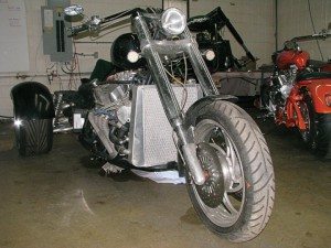 Sabertooth has developed its first WildCat trike, which will hit the market in 2015. Though this prototype features a Ford racing V-8 motor, the production model will be powered by an 850cc Weber engine. 