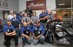 PowerSport Institute received four Indian Motorcycles from Polaris. Pictured, front row (left), PSI students Ken Ostrolenecki, Chris Peterson and Terry Weitzel. (Back) Ron Radeke, PSI V-twin manager; Sam DePriest, PSI student; Shaun Perry, PSI student; Tara Ivory, Polaris Industries; Laurie Rengel, Polaris Industries; Roy Mathes Jr., PSI student; and Bernie Thompson, PSI campus director.