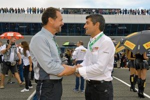 Giorgio Barbier, Pirelli Moto racing director (left) and Gregorio Lavilla, World Superbike sporting director, shake hands following the announcement of Pirelli’s contract extension.