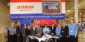 Yamaha officials celebrate the production of a Grizzly 700, the 3 millionth unit to roll off the assembly line at the company’s Newnan, Ga., factory.