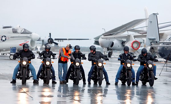 The scene from on the flight deck of the USS Yorktown while six veterans and active-duty military ride the H-D Street 500 as Harley-Davidson  with the H-D Street 500 as Harley-Davidson announced it is offering current and former U.S. military free Riding Academy motorcycle training in Mt. Pleasant, S.C., Wednesday, May 6, 2105.  (Mic Smith/AP Images for Harley-Davidson)