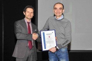 Claudio Domenicali (right), CEO of Ducati Motor Holding, receives the ISO 14001 certificate on behalf of the company’s Bologna, Italy, plant. 