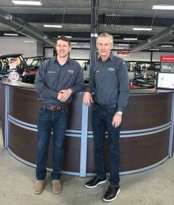 Brewer Cycles owner Chris Brewer (right) and his son Tyler Brewer, VP of the dealership, at their dealership in Henderson, N.C. The Duke Children’s Hospital Charity ride began 18 years ago in gratitude after Tyler received care fighting childhood cancer.