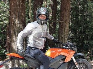 Gart Sutton aboard a Zero motorcycle in the Redwoods of California.