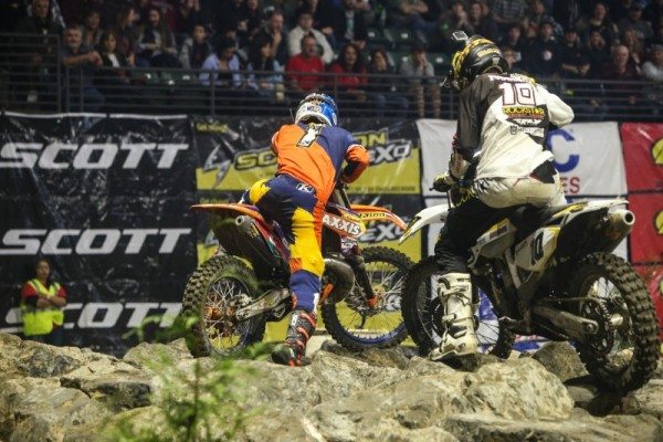 Webb (1) and Haaker (10) fight for their balance and the lead in the difficult rock section in Everett. Photo: Drew Ruiz