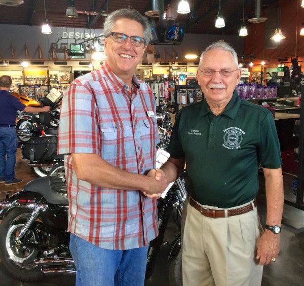 Naples Harley-Davidson general manager John Taber (left) and retired Gen. Frederick M. Franks, Jr.