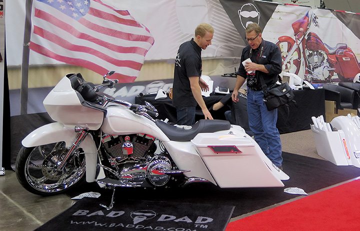Ernie Copper of Thunder Press talks to the representatives of Bad Dad at V-Twin Expo.