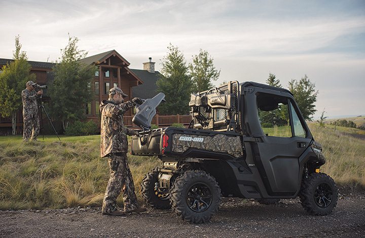 The 2016 Can-Am Defender XT Cab Mossy Oak camo edition.