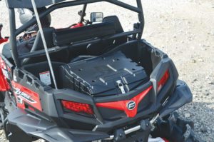 SuperATV’s cargo box attaches securely to the rear bed of the CFMOTO ZForce 800 EX.