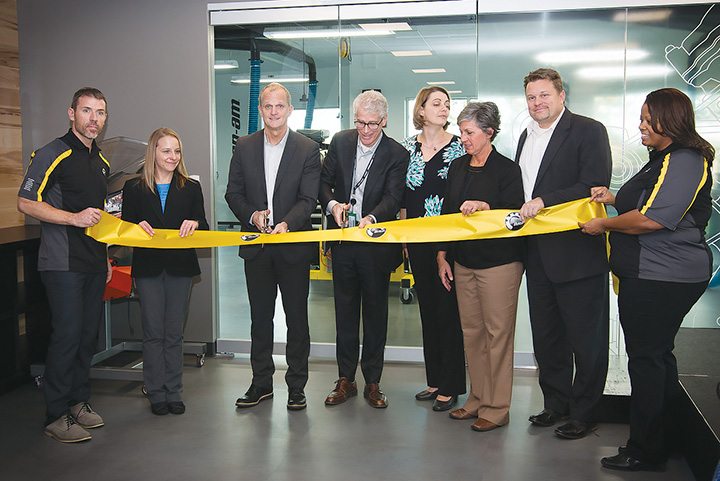 BRP celebrated the grand opening of its North American training facility with a ribbon cutting in November. BRP’s Martin Soucy (center left) and Alain Villemure (center right) were present to cut the ribbon.