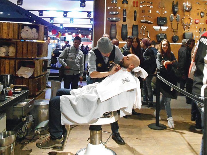 Moto Guzzi fans could shop for bikes, and get a quick shave, in the Moto Guzzi booth.