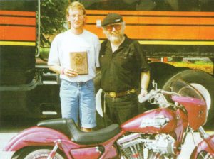This 1992 photo shows Brian Klock and Willie G. Davidson with Brian’s first custom bike.