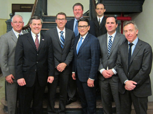 Front, left to right: Tim Cotter, Rob Dingman, John Hinz, Tim Buche, Iain R. McPhie, Mario Di Maria Back, left to right: Rick Alcon, Carroll “C.R.” Gittere