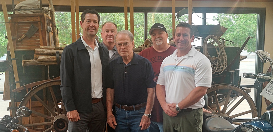 From left: Tom Macatee, David Clay, Larry Hay, Michael Keeton, Mike Pate in front of the famous Wild West Chuck Wagon.