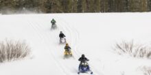 snowmobile riders