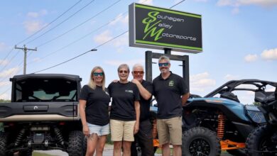 Mullin family in front of dealership